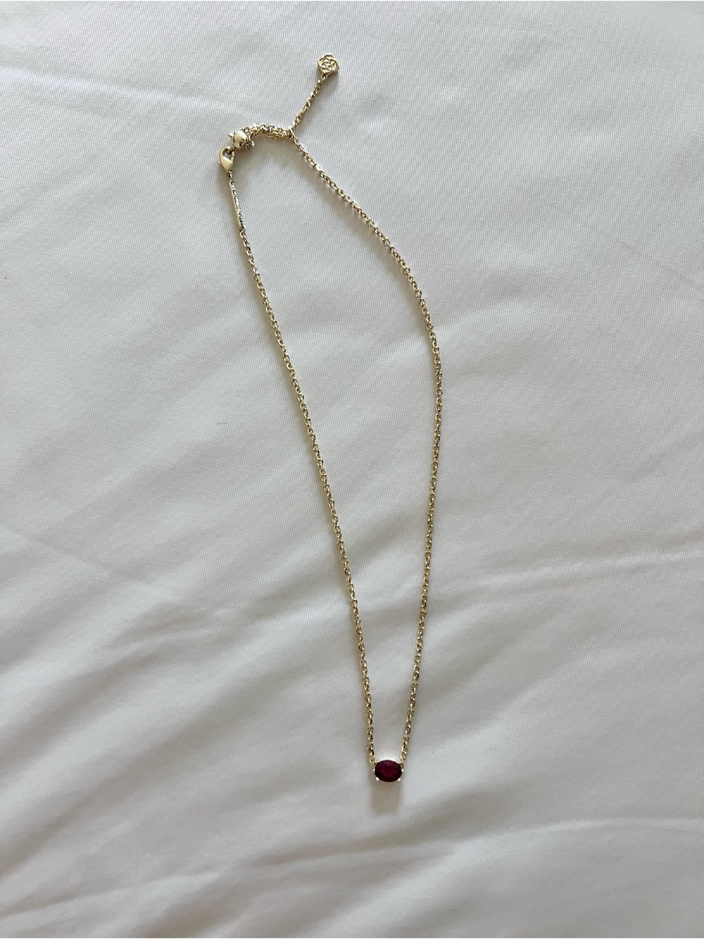 Kendra Scott Gold Necklace with Red Stone Pendant